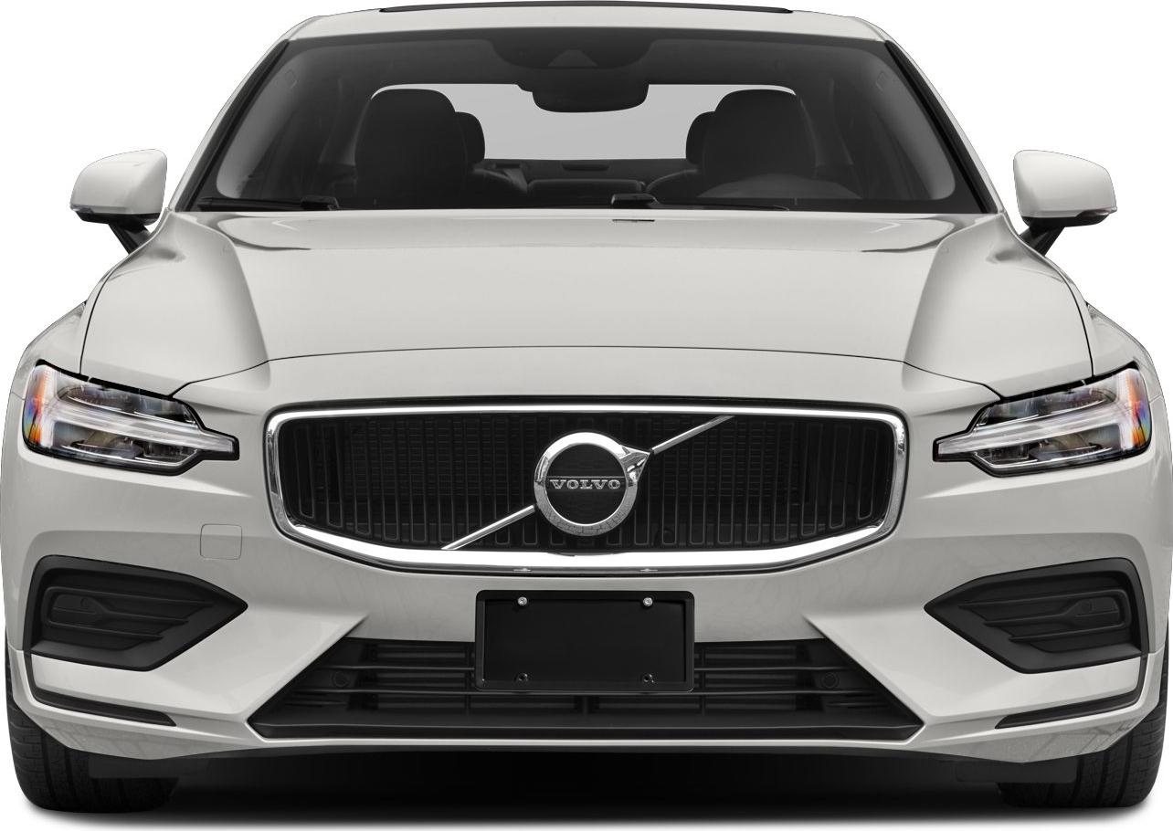 front view of a white Volvo car showing grille with Volvo emblem, headlights, and side mirrors