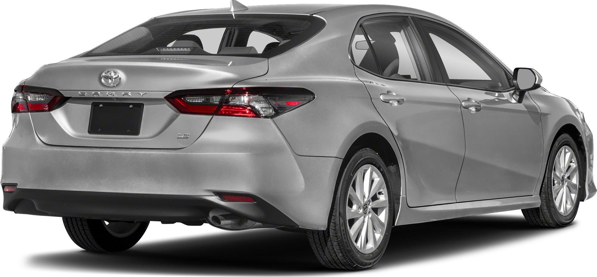 rear and side view of a silver Toyota Camry sedan showing its tail lights, license plate area, rear bumper, and rear passenger doors