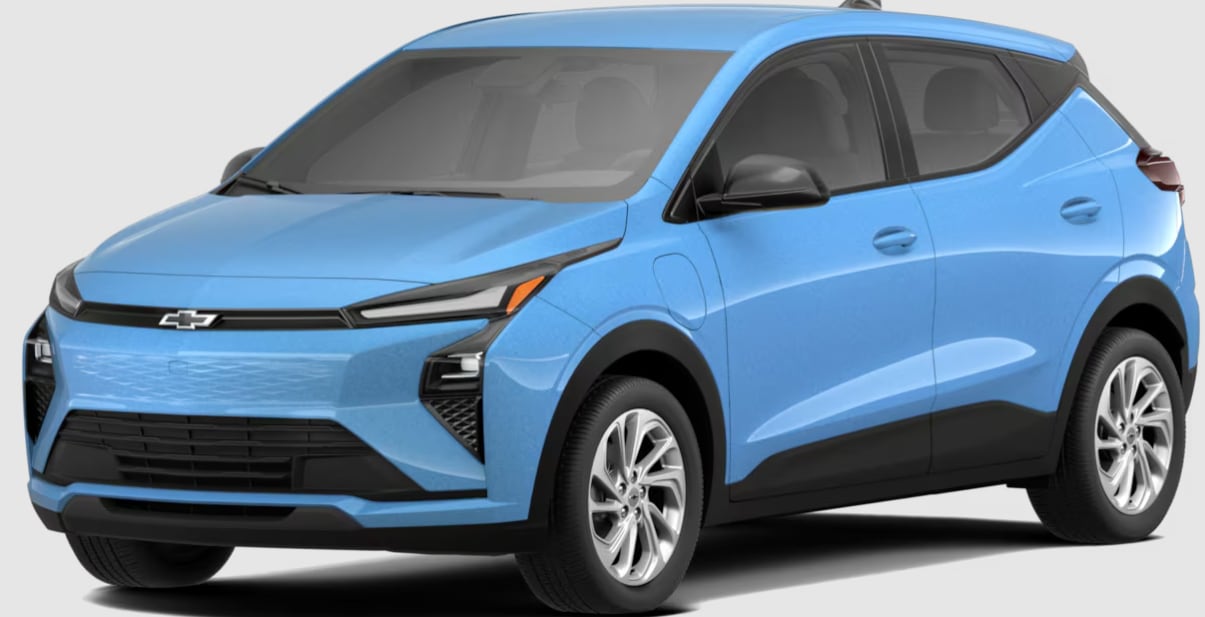blue compact electric SUV car viewed from front passenger side with black trim and silver alloy wheels