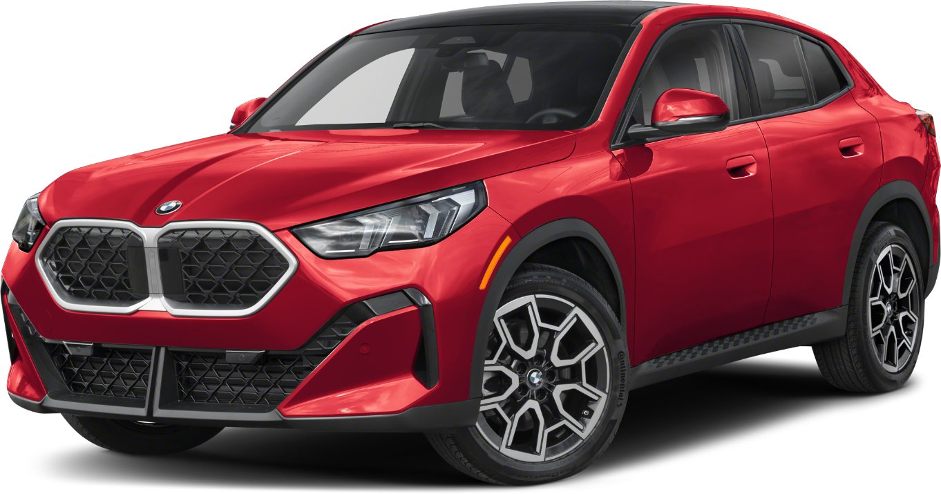 front side view of a red BMW compact crossover SUV car with black roof and sporty alloy wheels