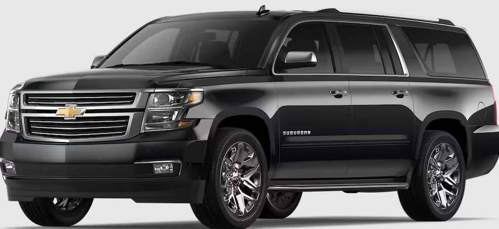 black Chevrolet Suburban SUV three-quarter front view on white background
