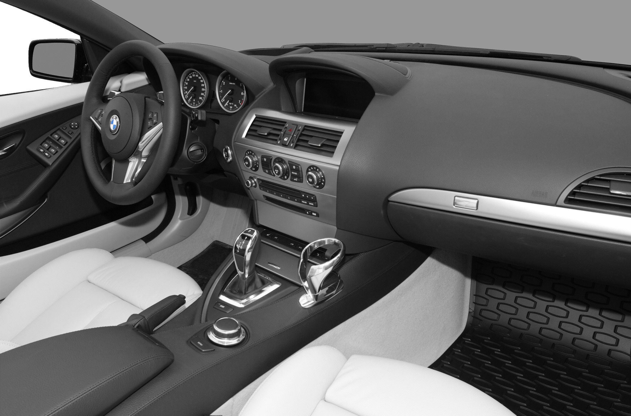 Dashboard and steering wheel with gear shifter in a luxury convertible interior