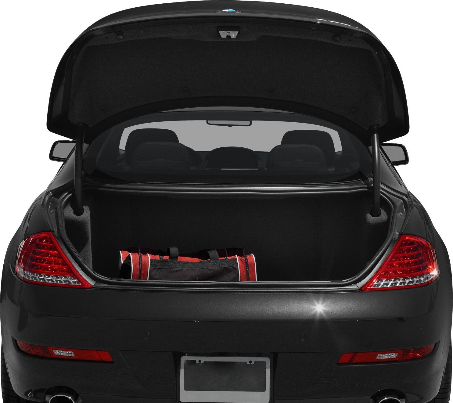 Open rear trunk with visible luggage compartment and taillights.