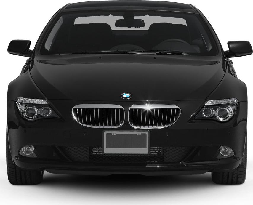 Front view featuring kidney grille and headlights of a luxury coupe.