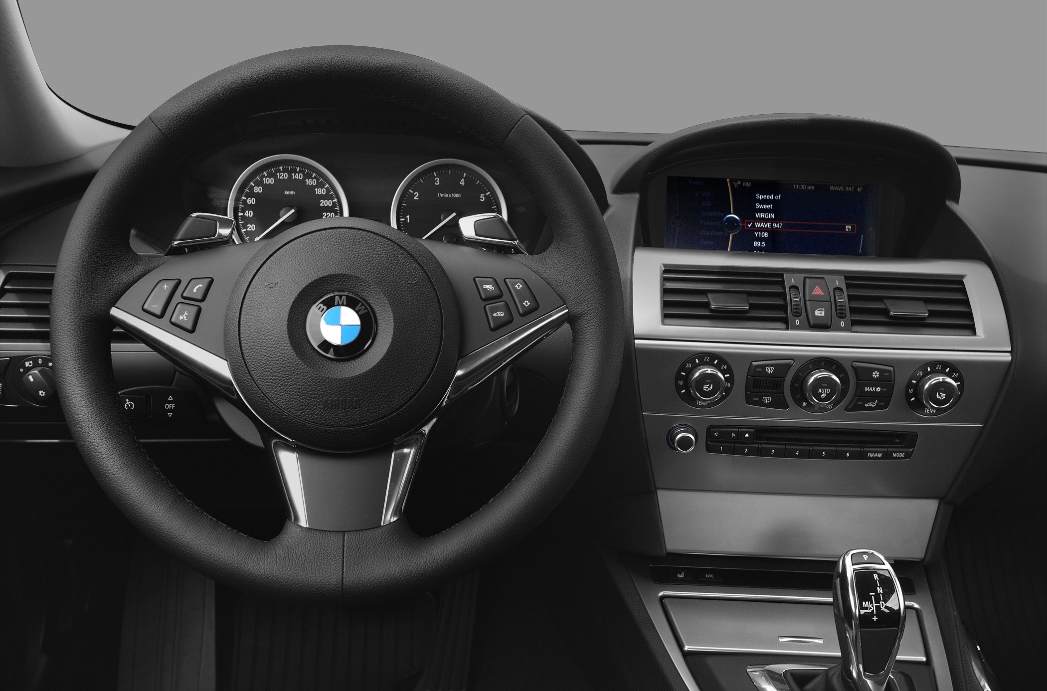 Steering wheel, instrument cluster, center console, and gear selector