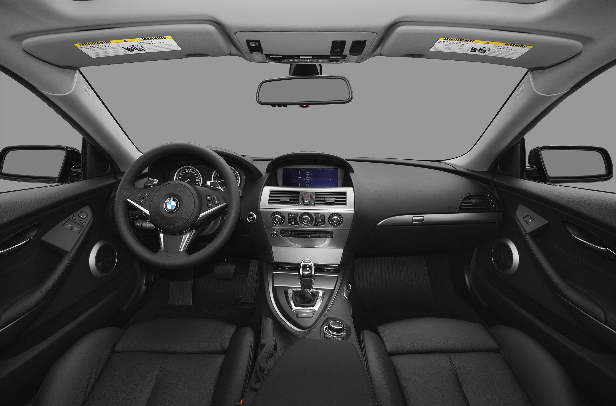 Dashboard and steering wheel with multifunction controls and center console