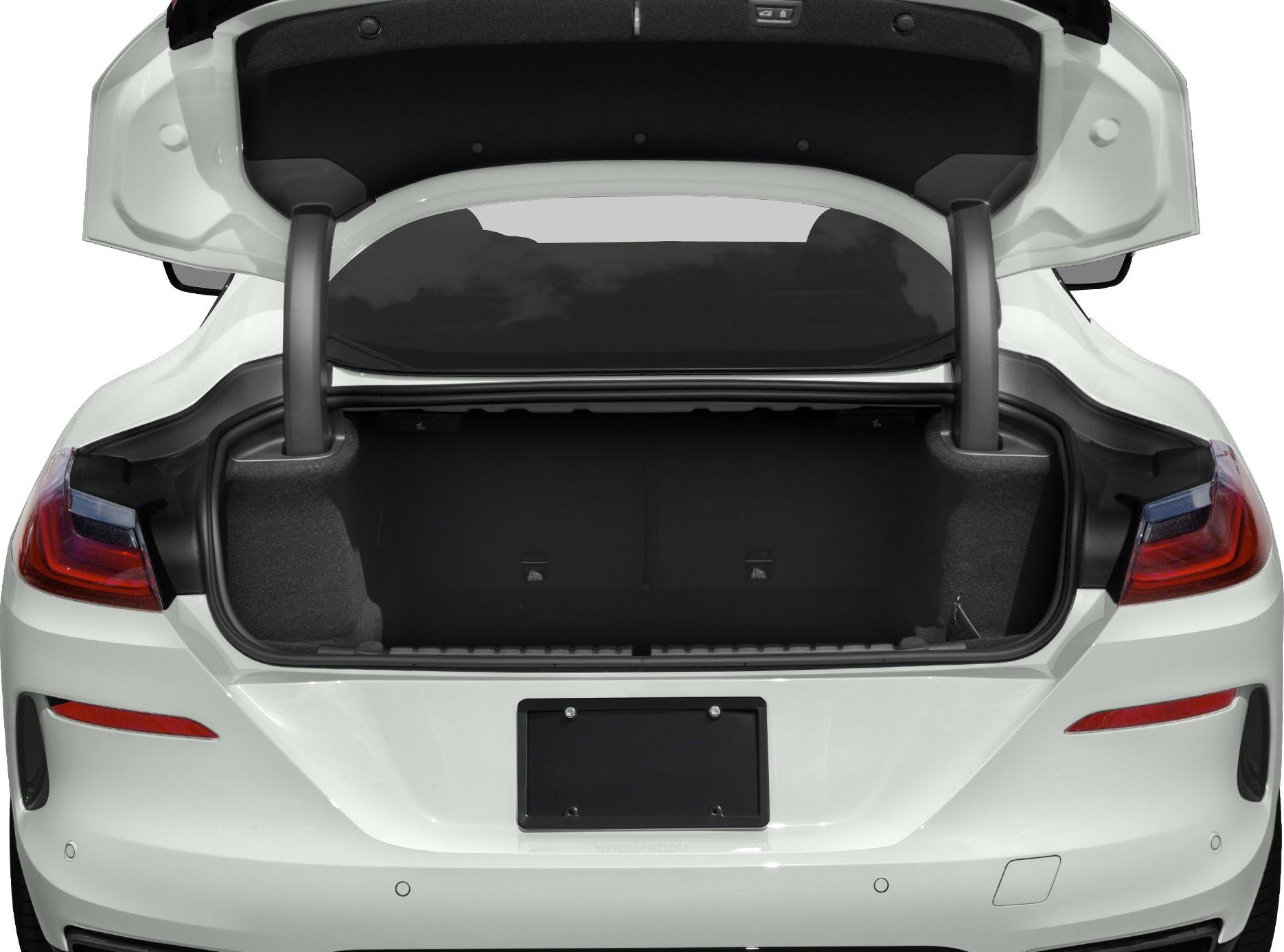 Open trunk with spacious cargo area and visible rear lights.