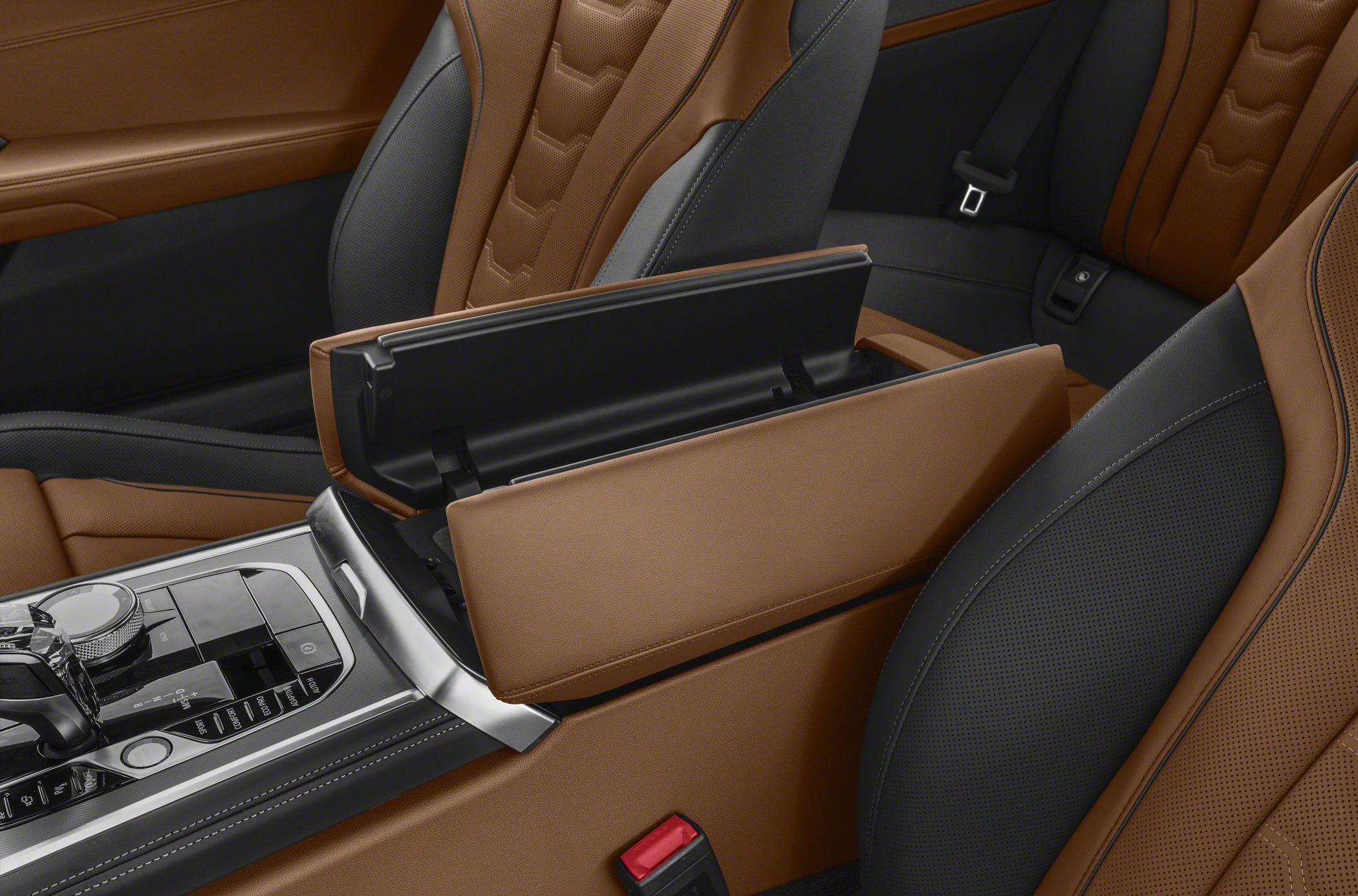 Premium center armrest storage and perforated leather seating upholstery