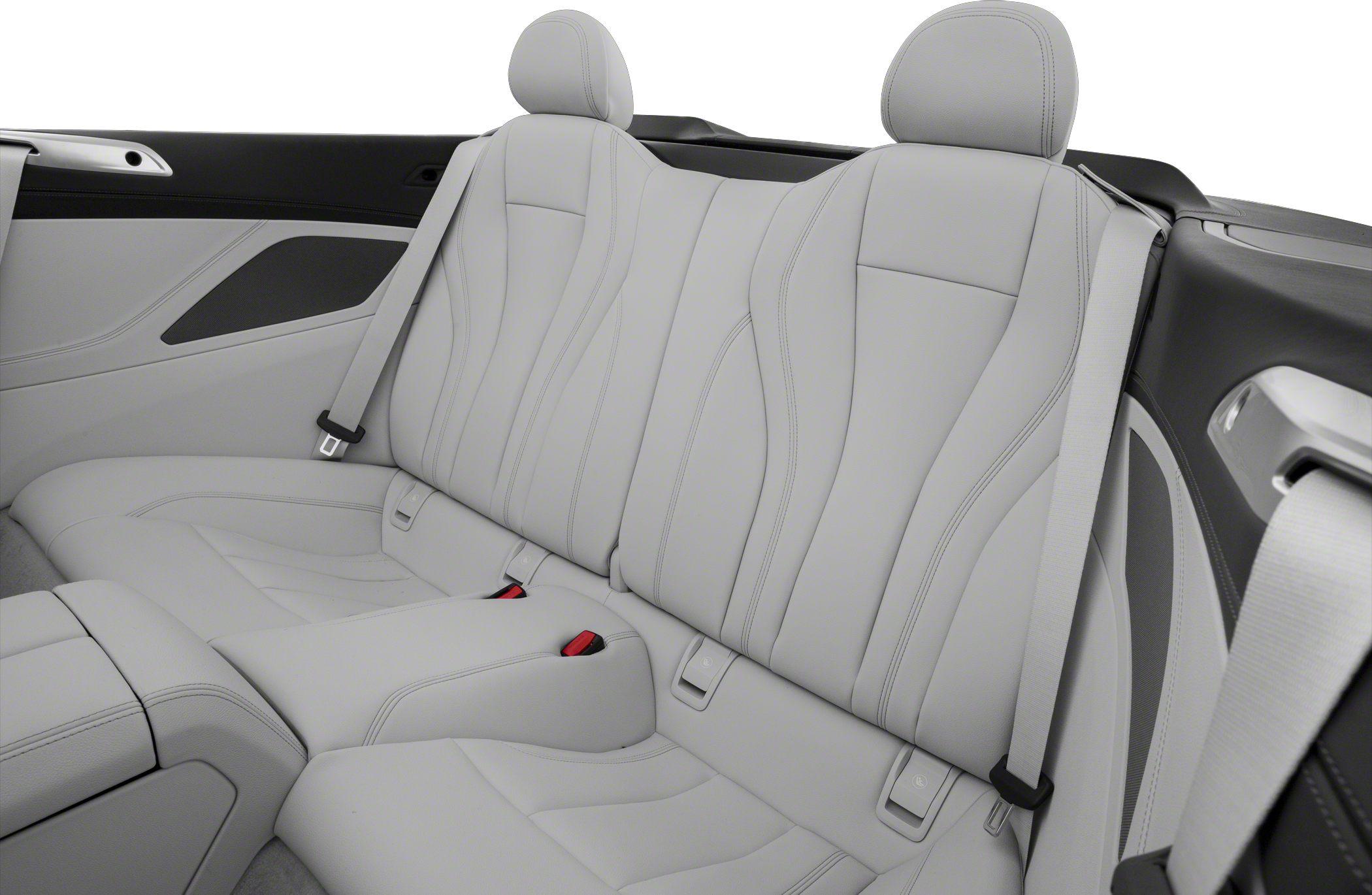 Rear leather seats with integrated headrests and seat belts