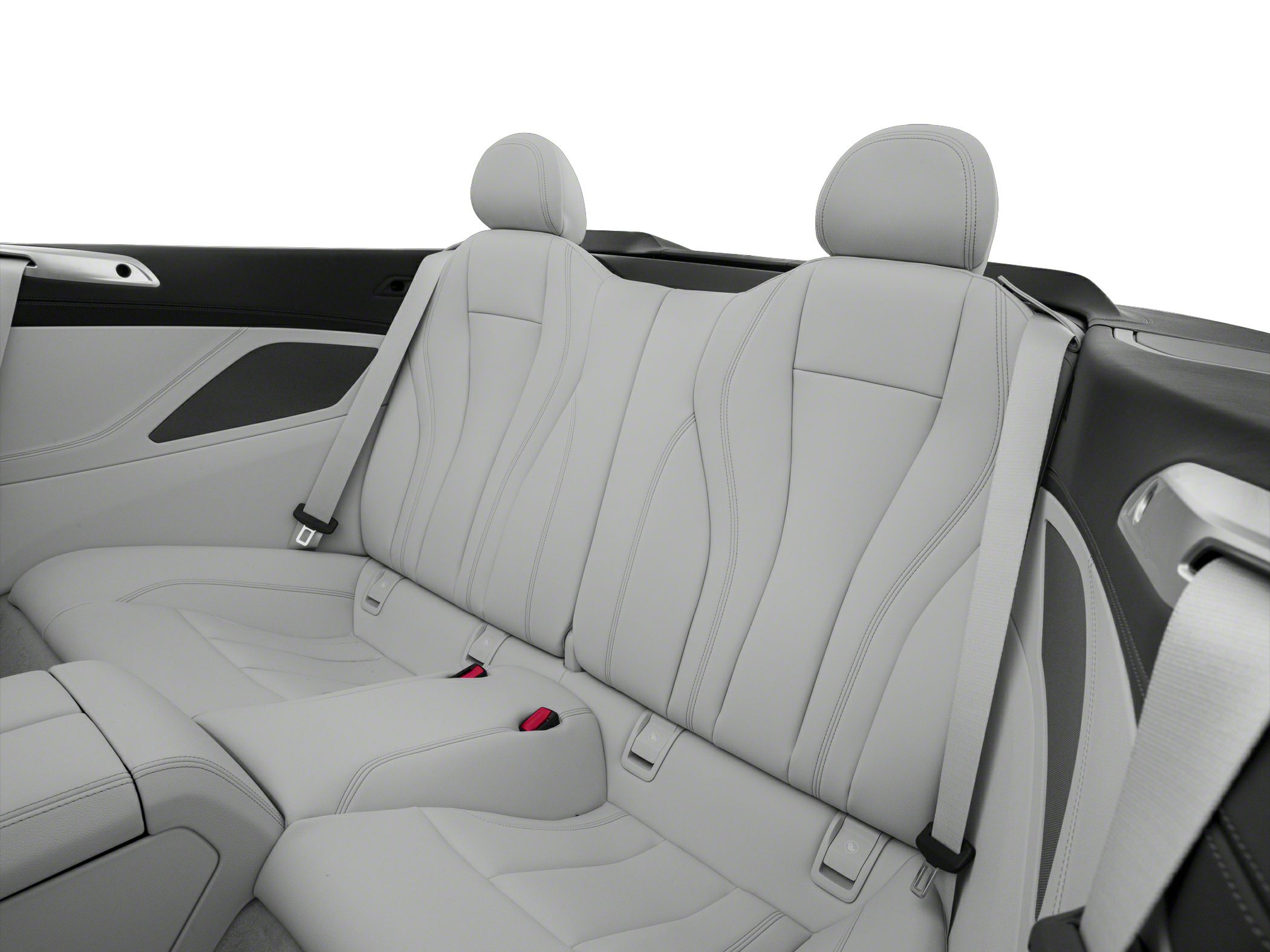 Luxury rear seat interior with premium leather upholstery and seatbelts