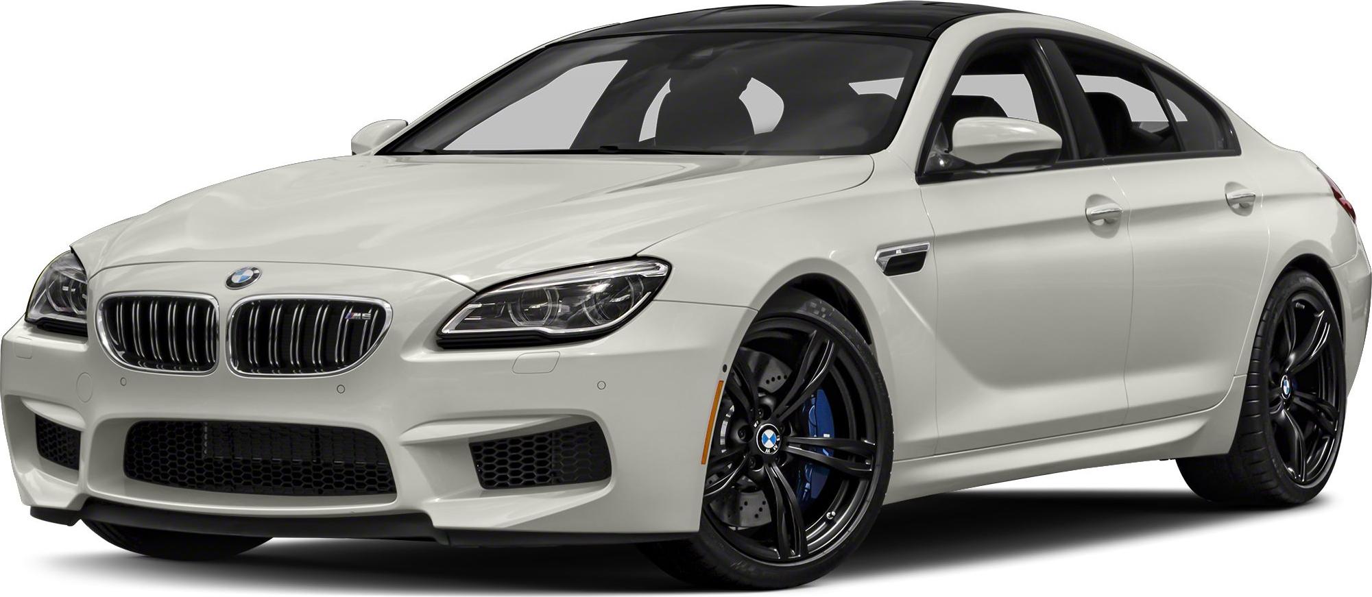 Front angle with aggressive grille and black alloy wheels