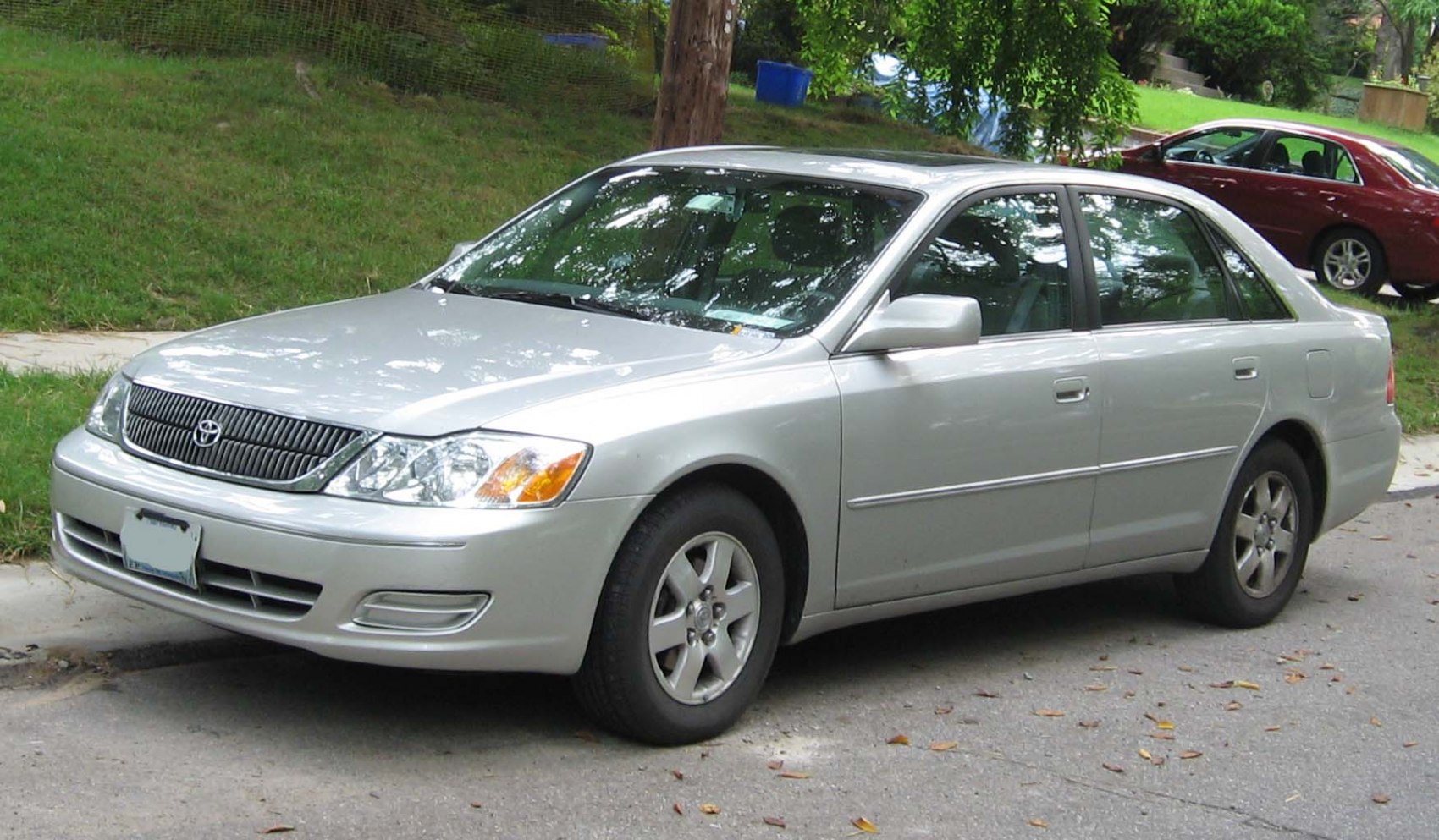 Mid-size sedan with chrome grille and alloy wheels