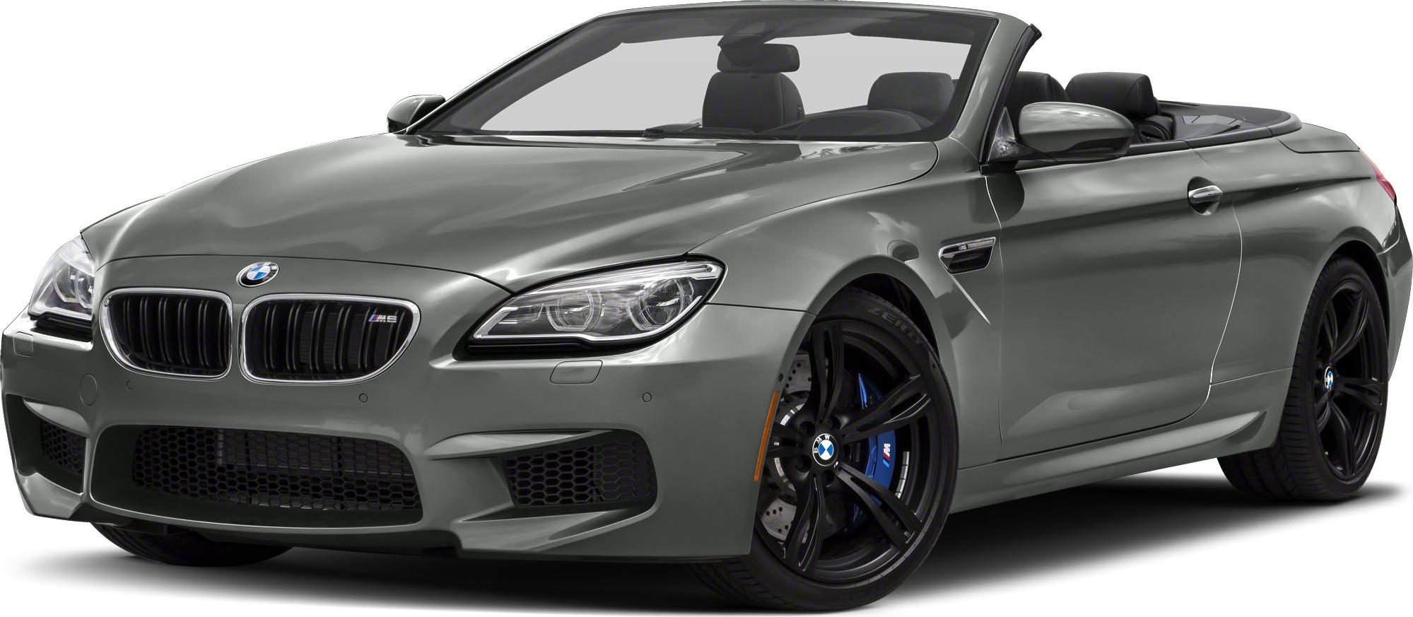 Convertible front view with aggressive grille and black alloy wheels with blue calipers