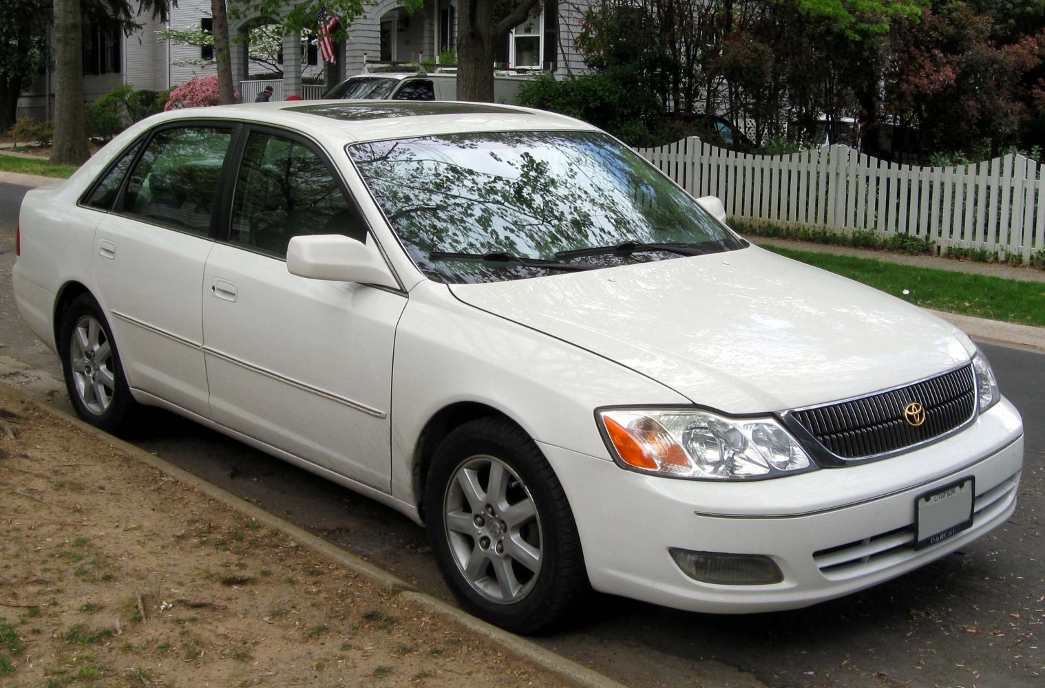 Sleek front grille and alloy wheels on a mid-size sedan
