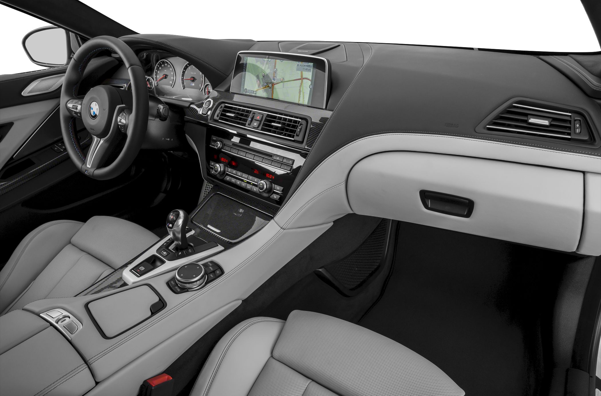 Luxury car interior with navigation touchscreen and sport steering wheel