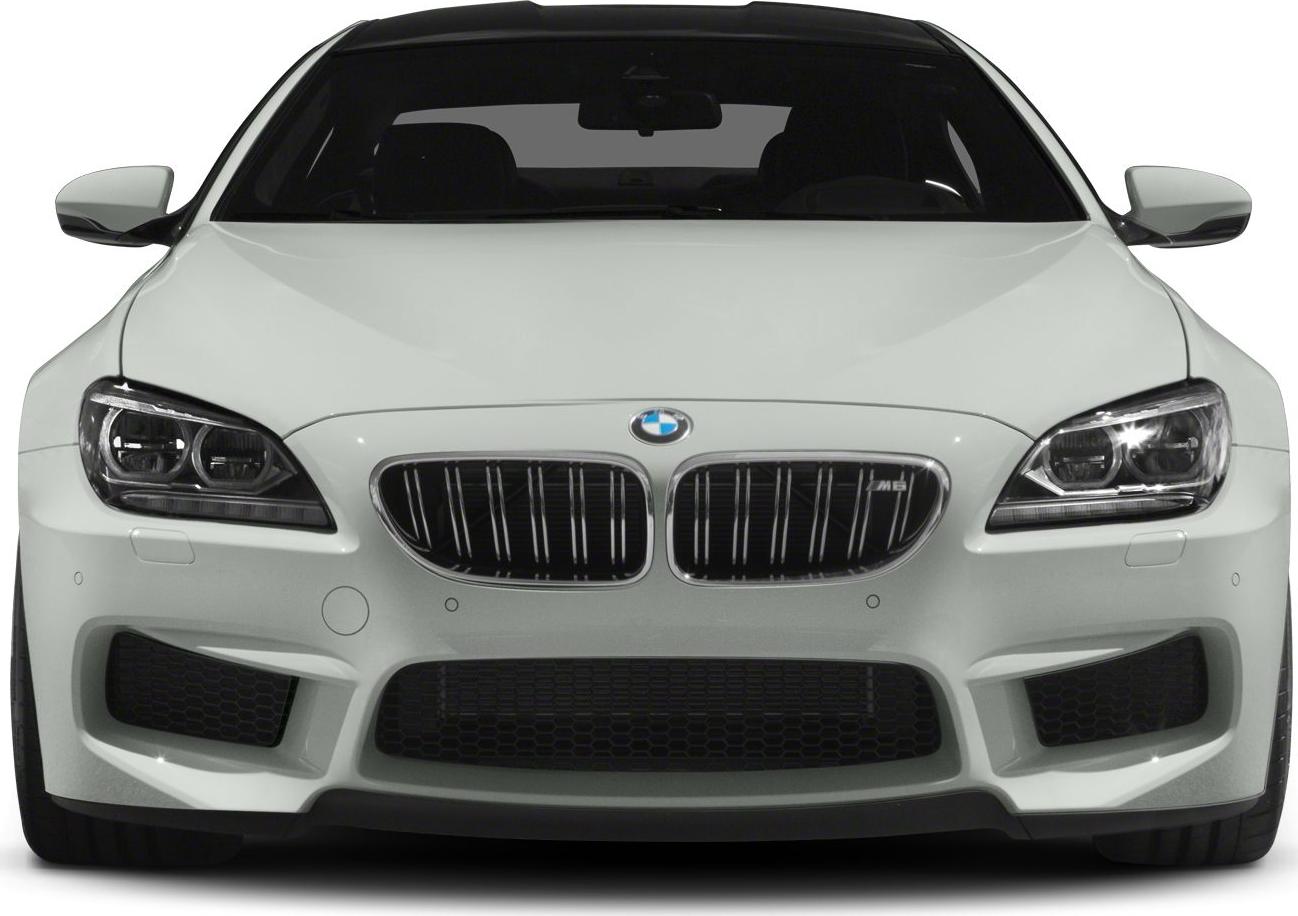 Front view of a luxury sedan with kidney grille and aggressive headlights.