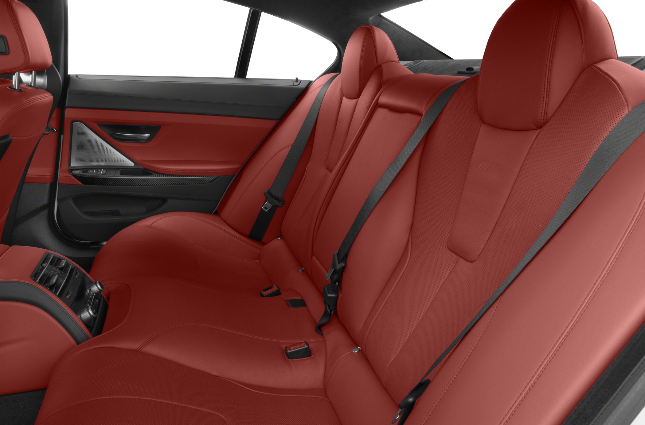 Red leather rear seats with sporty design and seat belts.