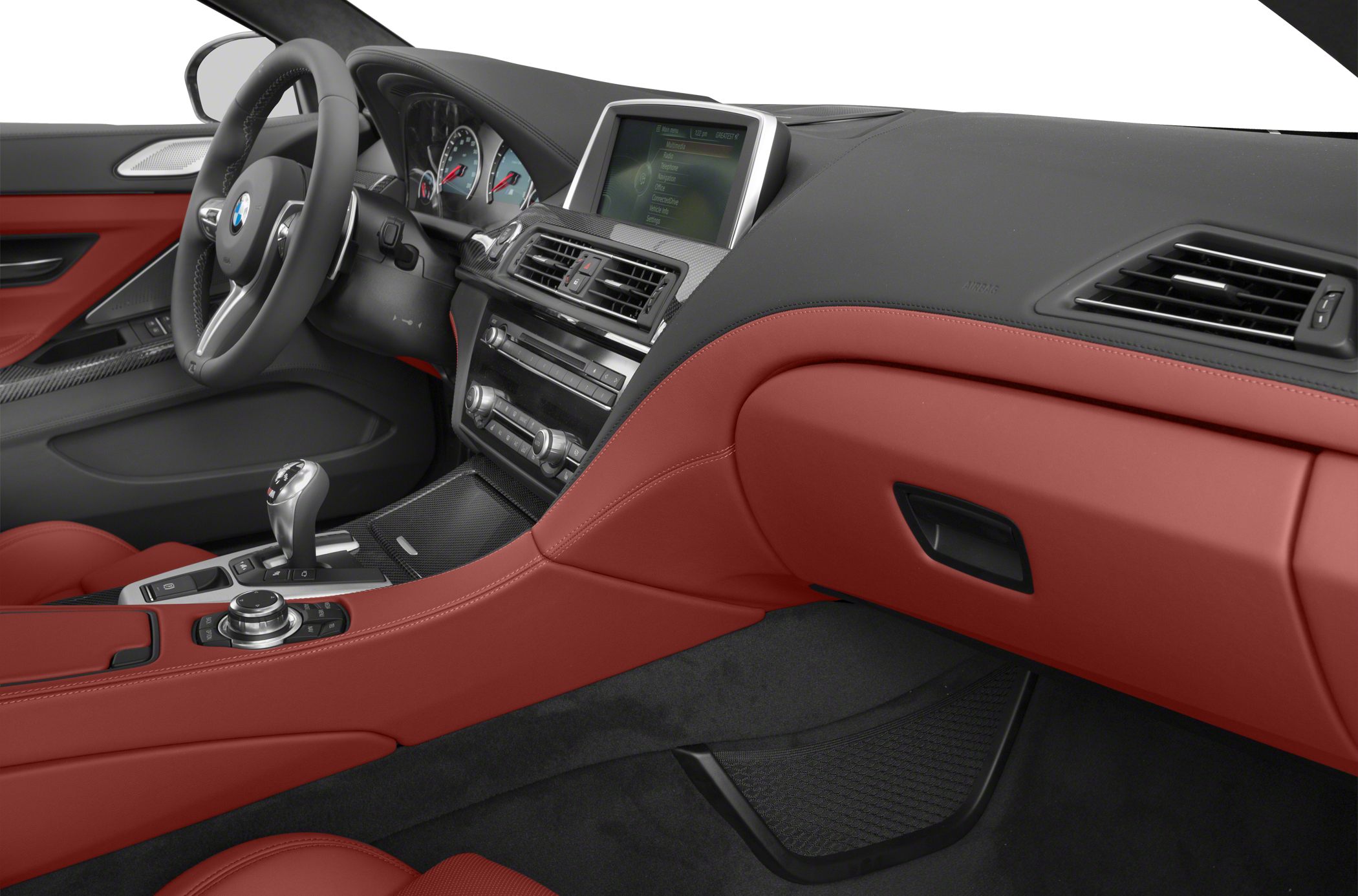 Dashboard and center console with red leather upholstery