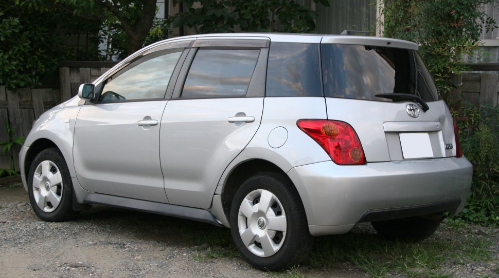 Silver hatchback with tinted rear windows and distinct rear lights.