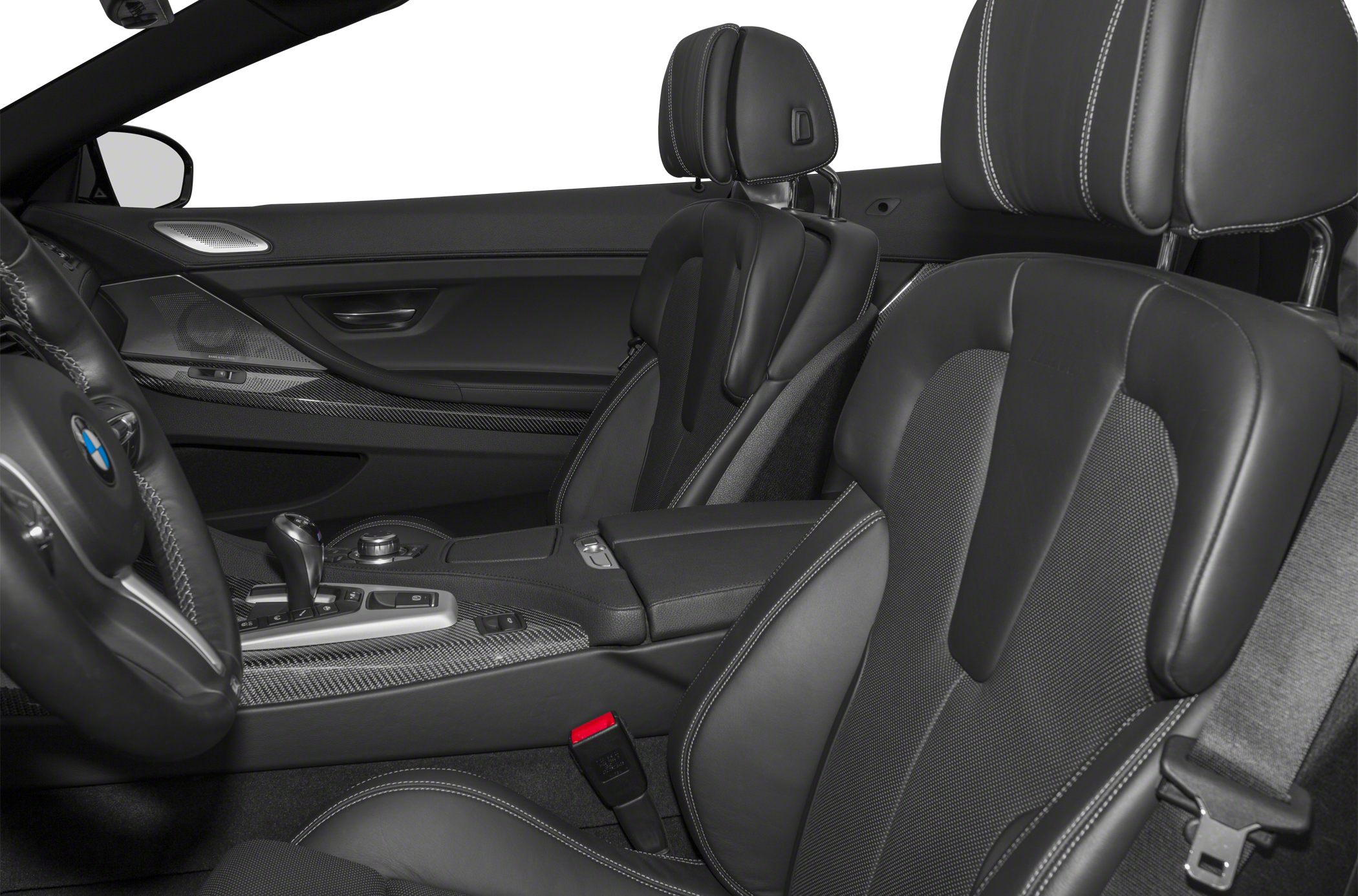Black leather seats with carbon fiber trim in a luxury convertible interior