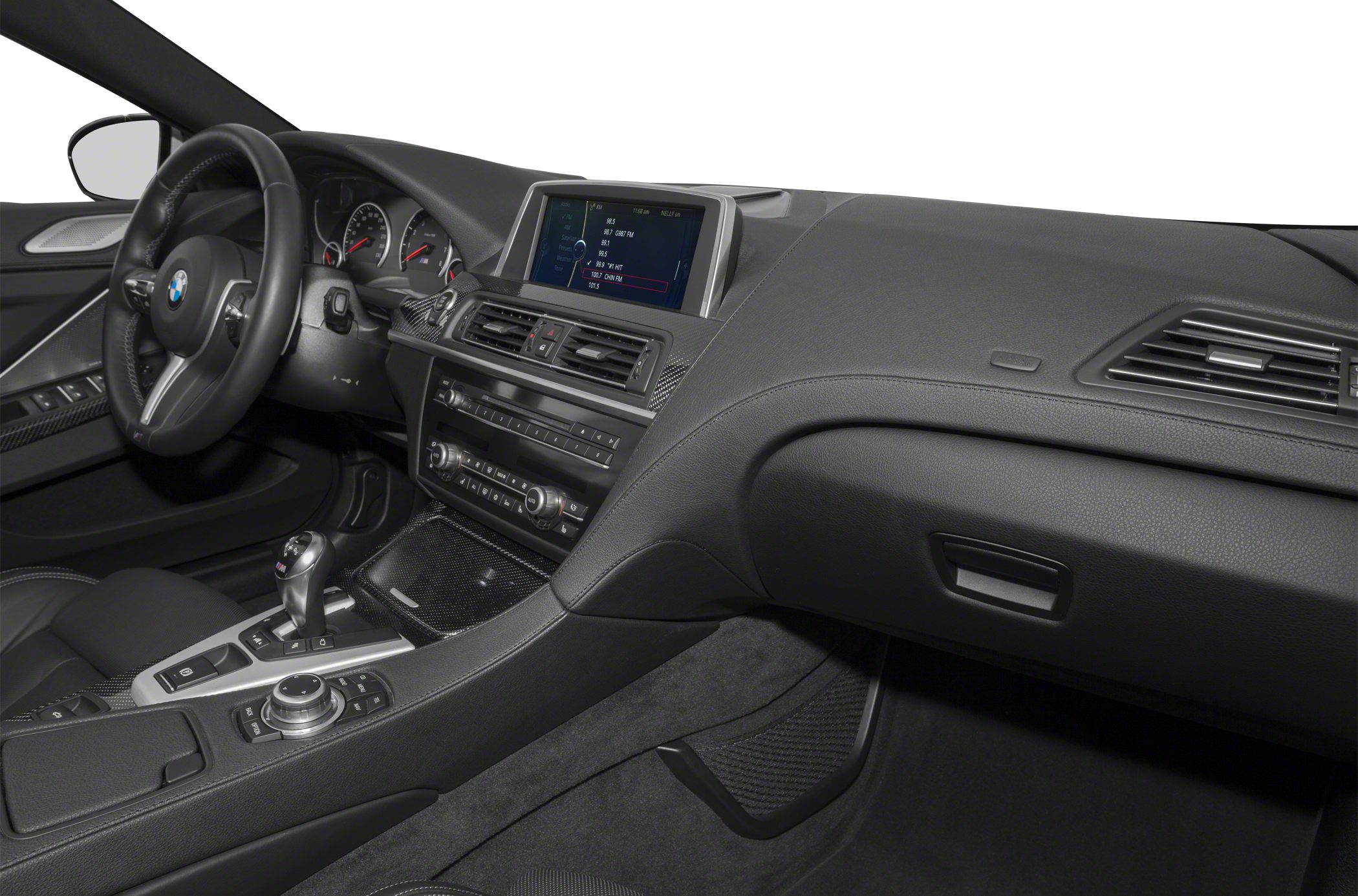 Dashboard, infotainment screen, steering wheel, and center console controls