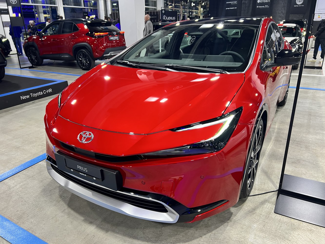 Sleek LED headlights and aerodynamic hood front view.