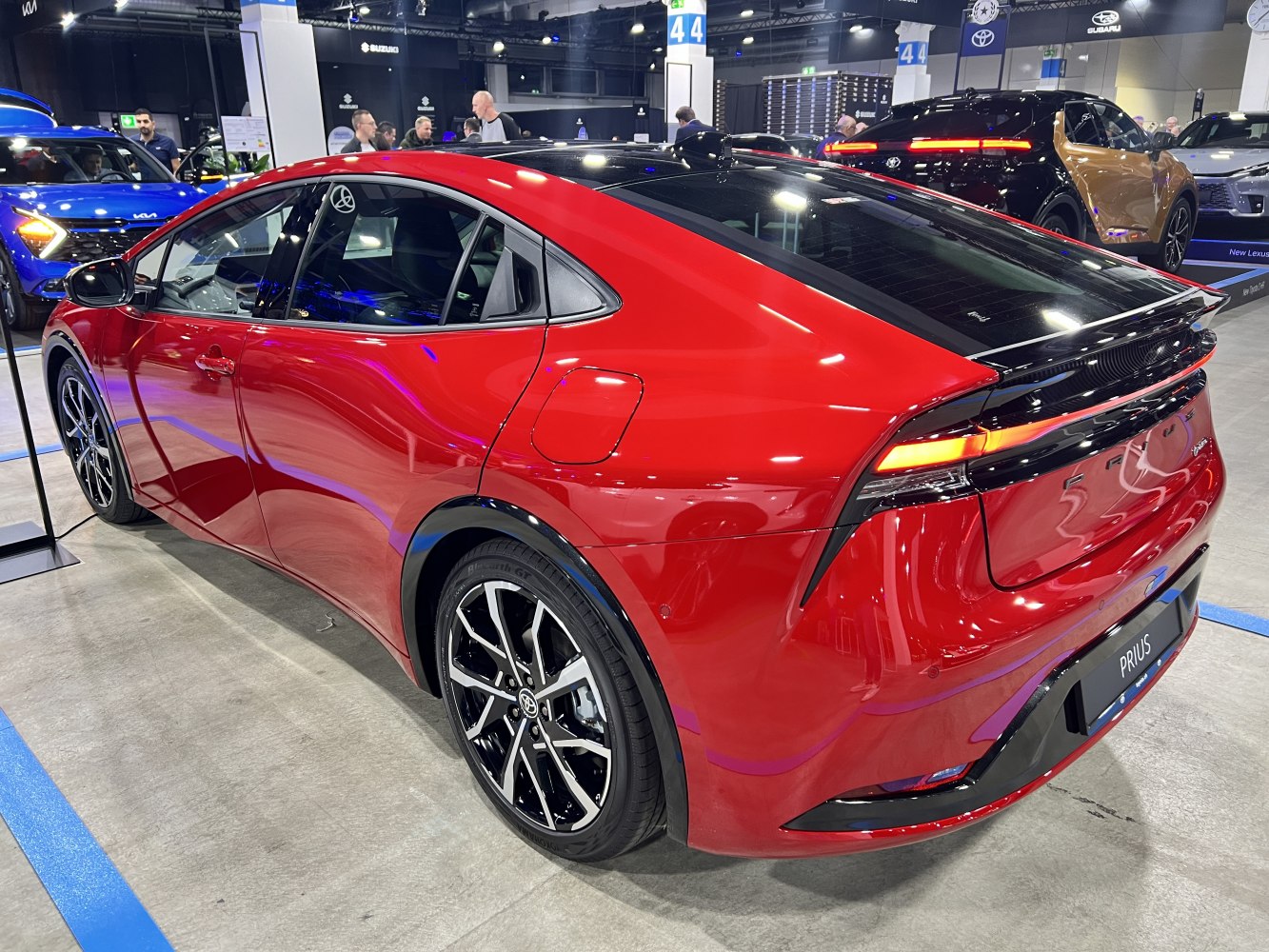 Sleek aerodynamic rear with modern taillights and alloy wheels.