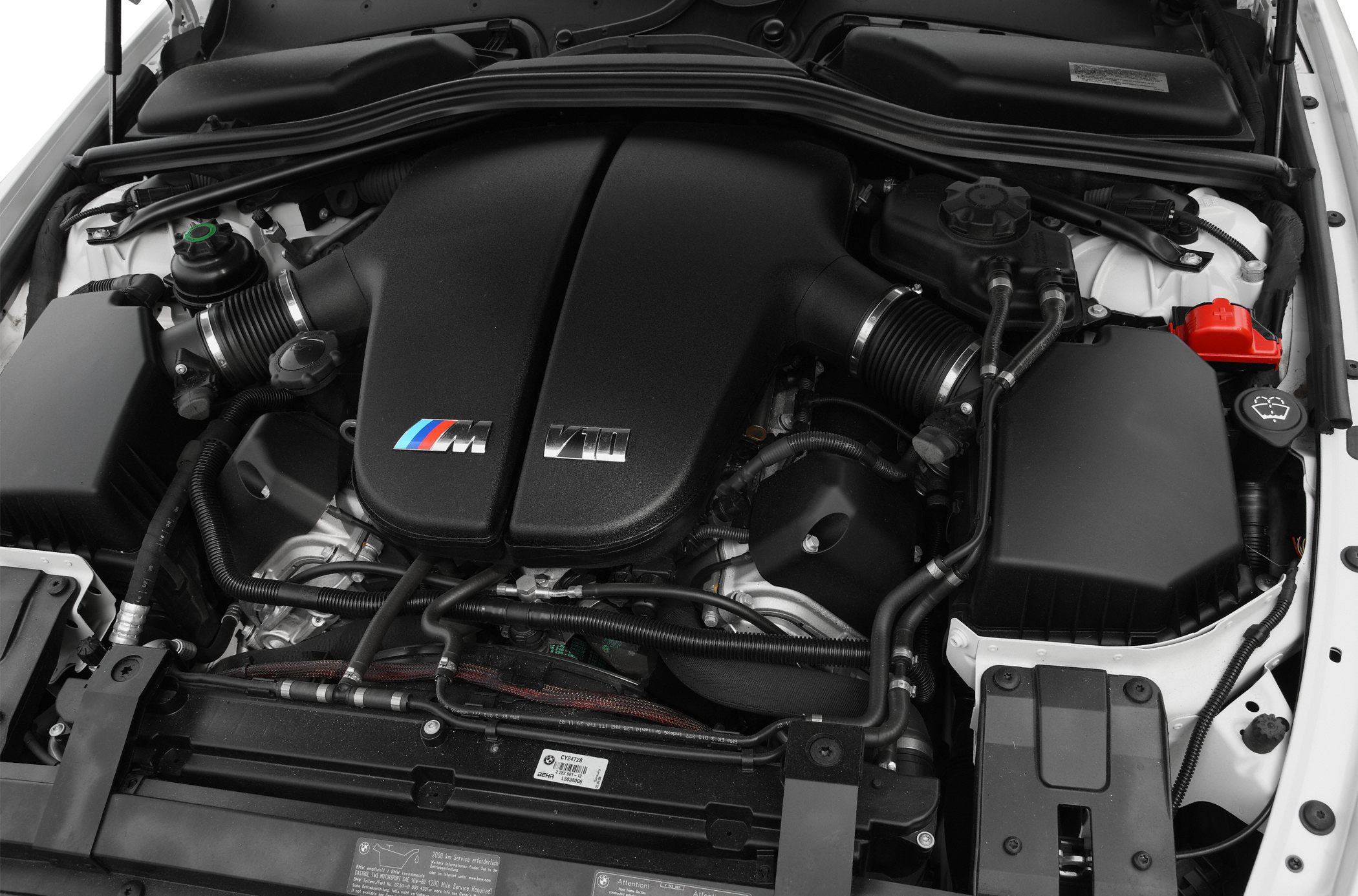 V10 engine bay with M branding in a facelifted coupe