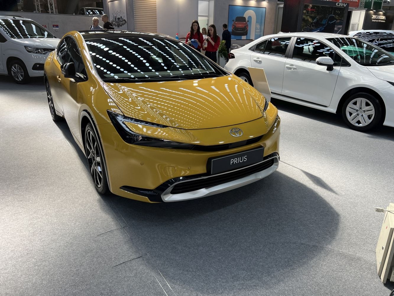 Front view with sleek LED headlights and aerodynamic design