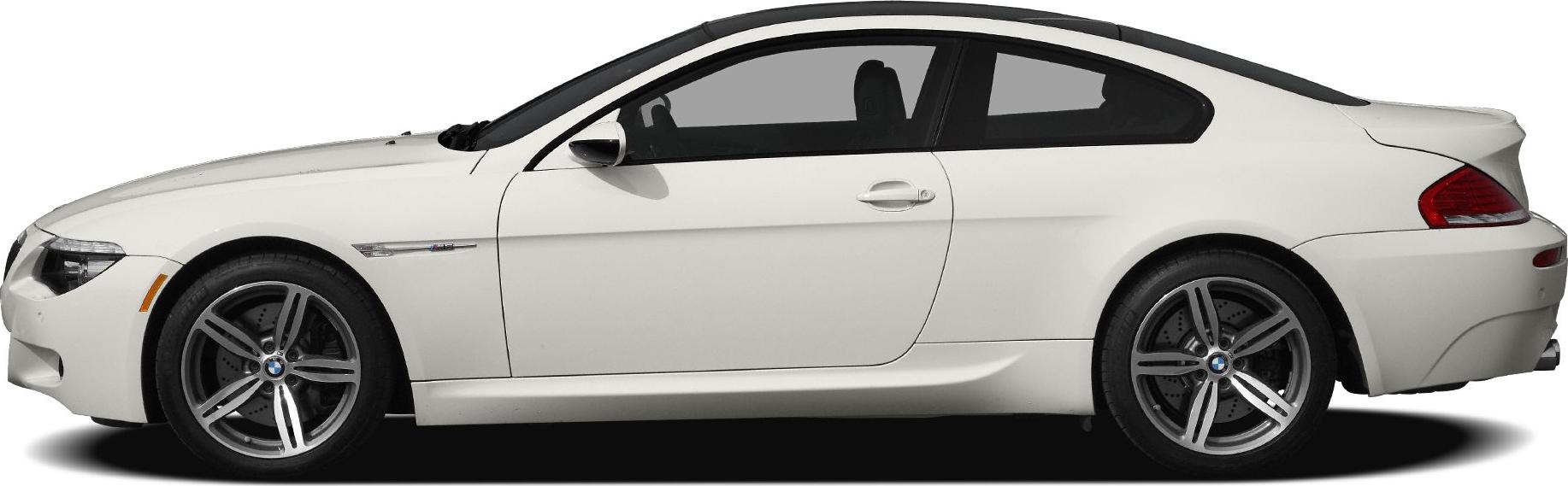 White two-door coupe with sporty design and alloy wheels side profile