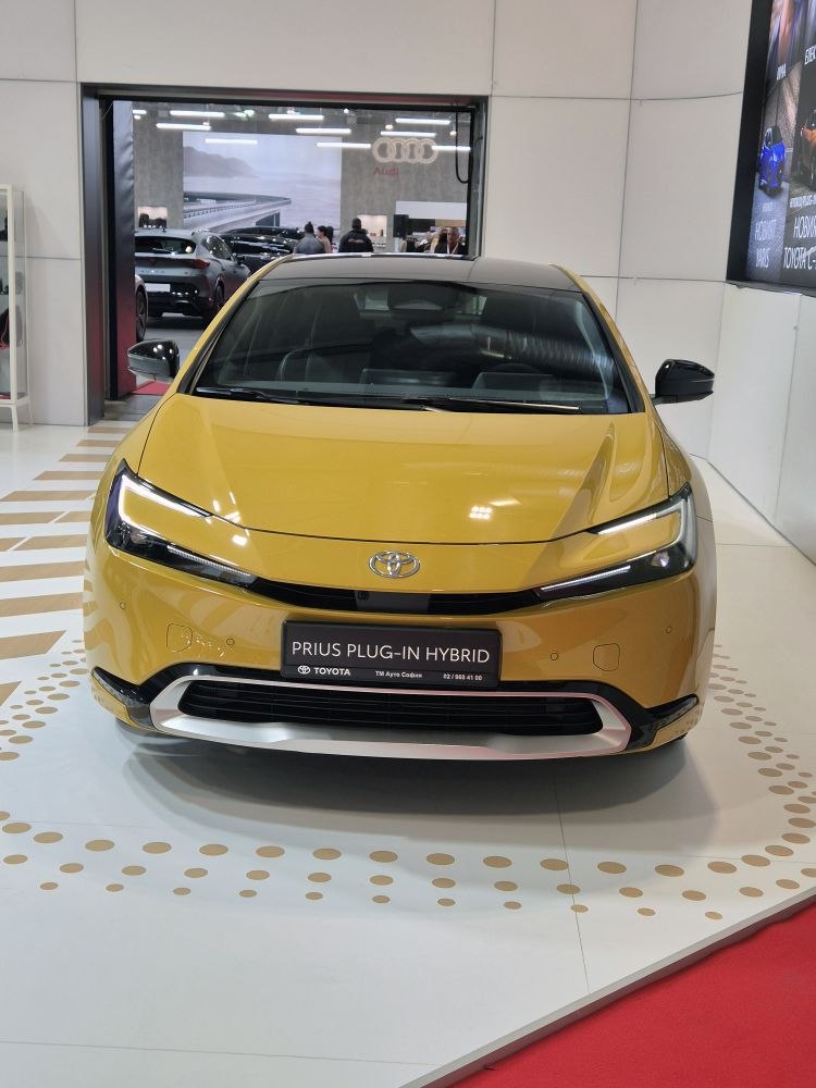 Front view with sleek LED headlights and aerodynamic design