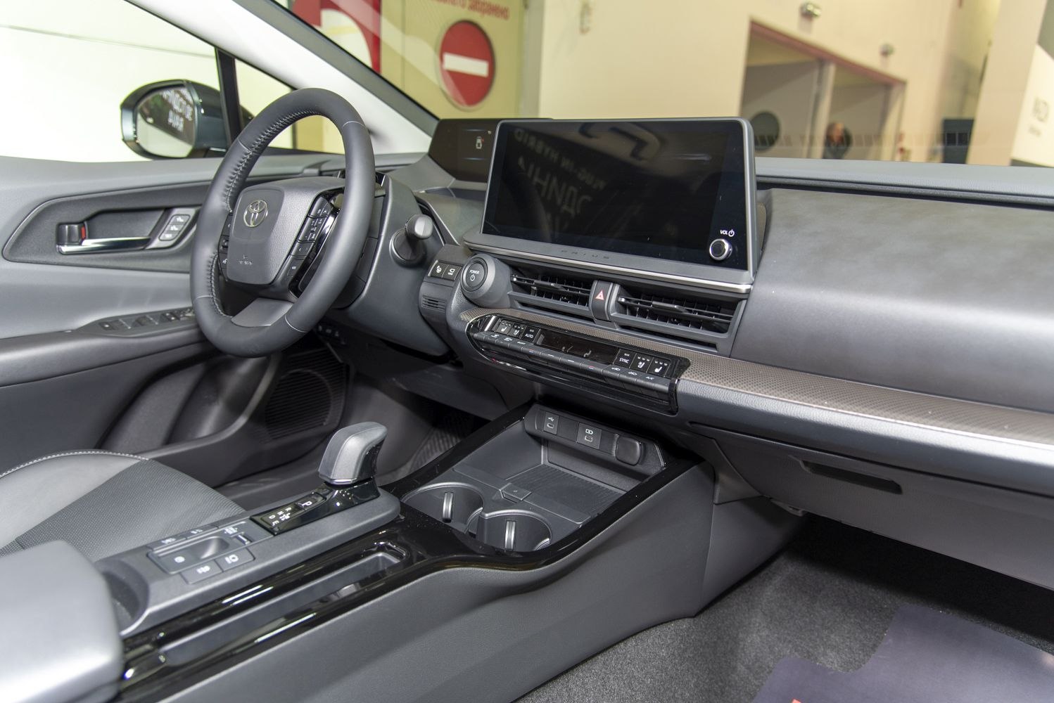 Digital touchscreen display and modern center console with steering wheel controls