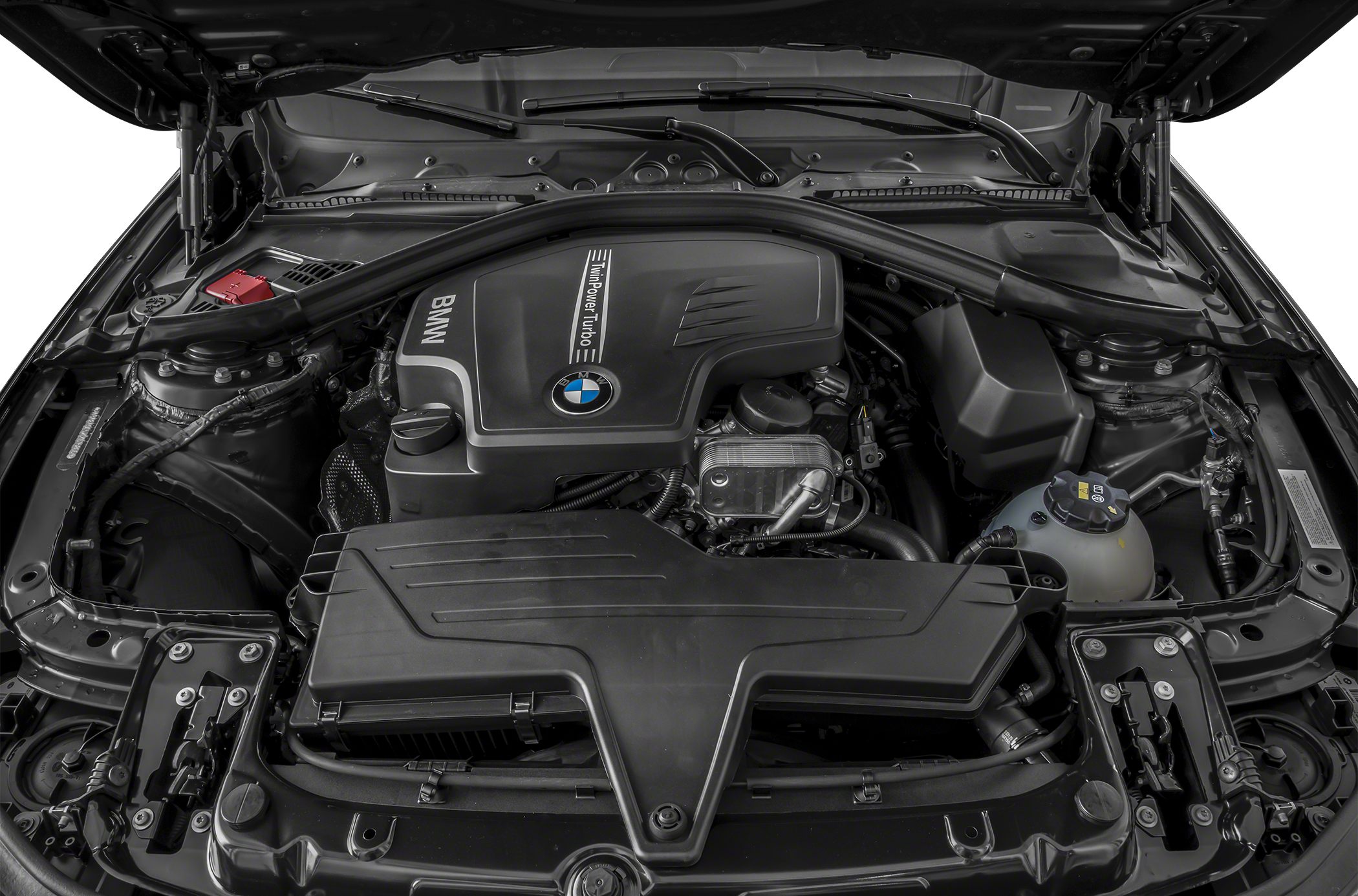 Close-up of a BMW TwinPower Turbo engine bay with visible components and structural elements