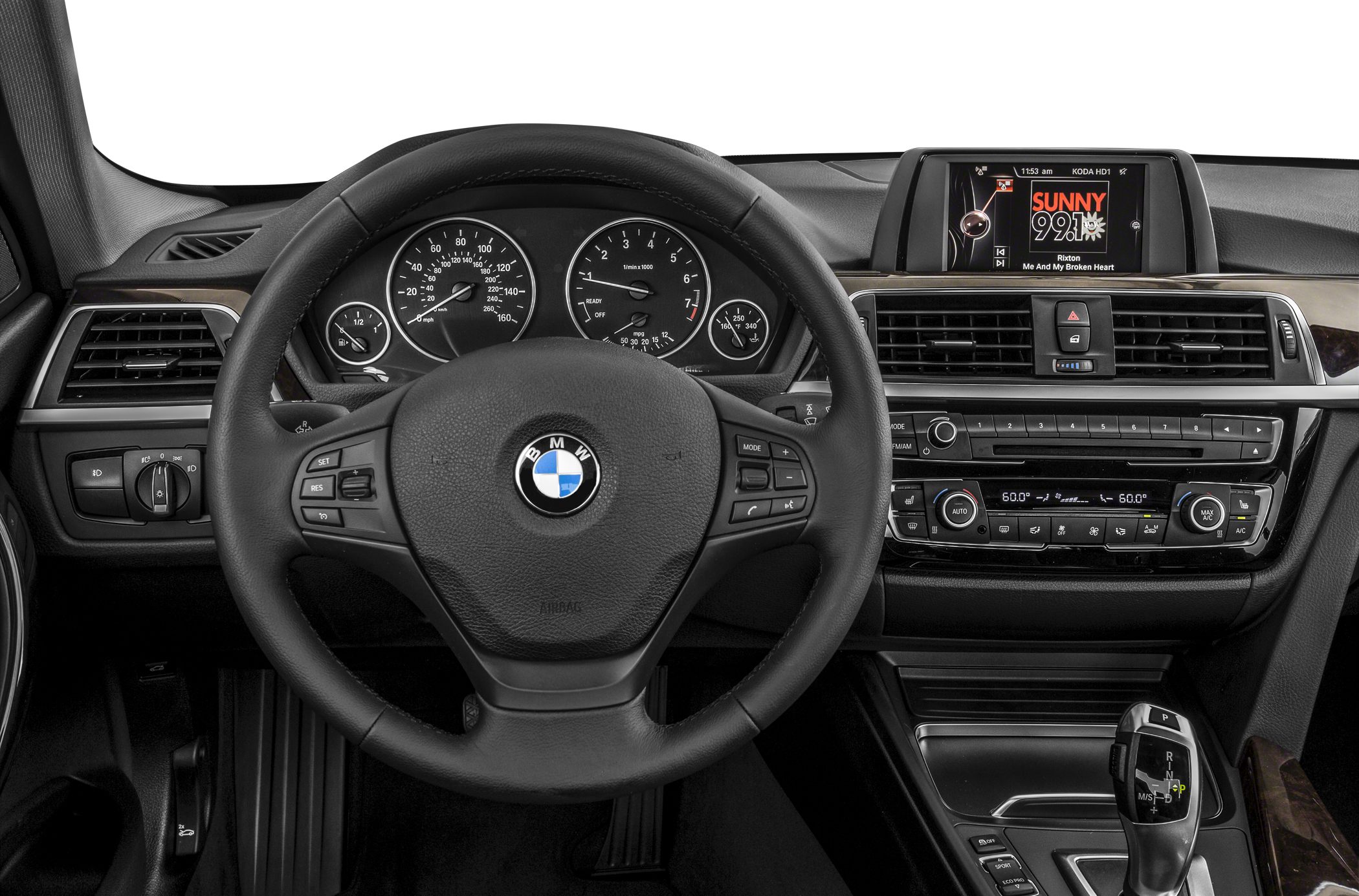 Modern dashboard and steering wheel with infotainment system and gear shifter