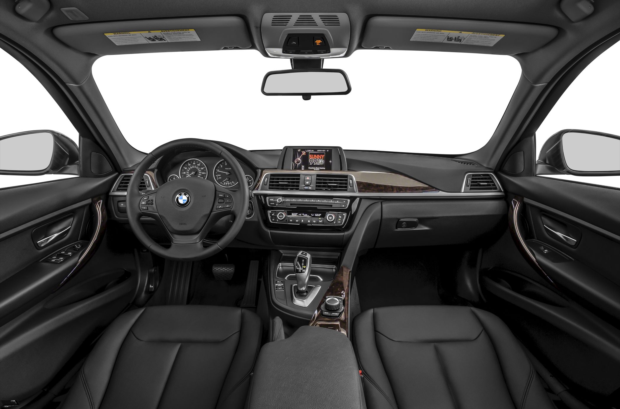 Dashboard, steering wheel, center console and seats in modern sedan interior.