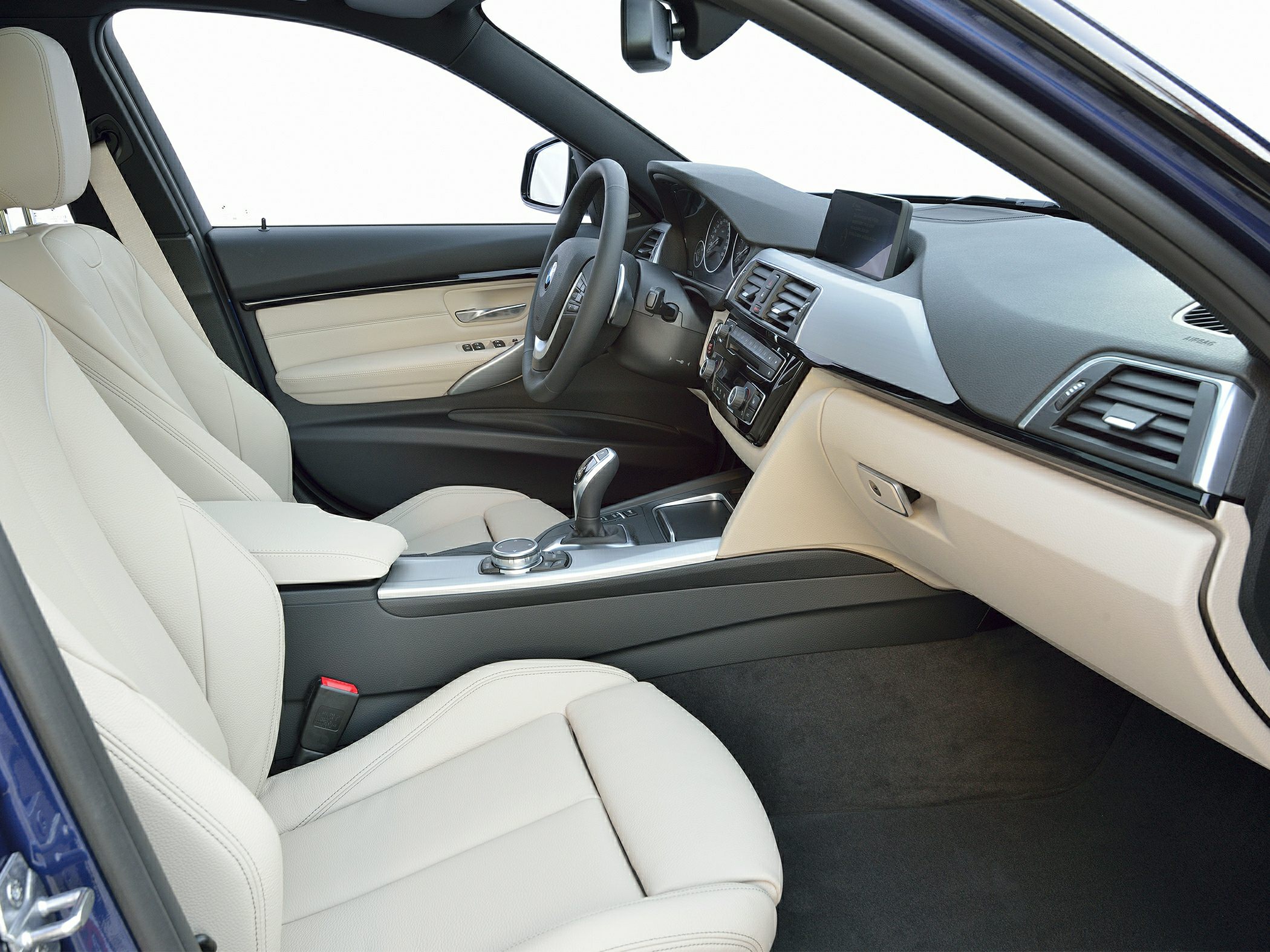 Beige leather seats and advanced dashboard with control interface