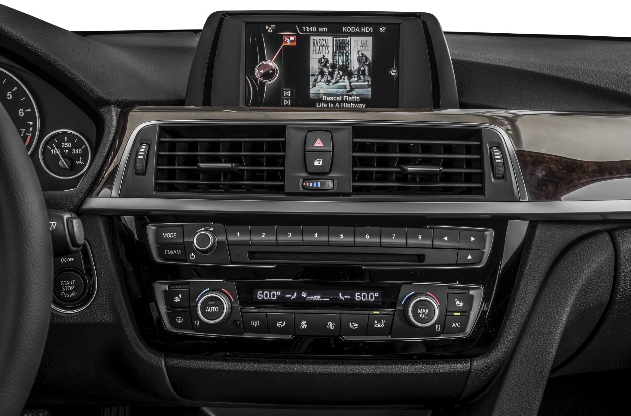 Car dashboard with infotainment screen and dual-zone climate controls
