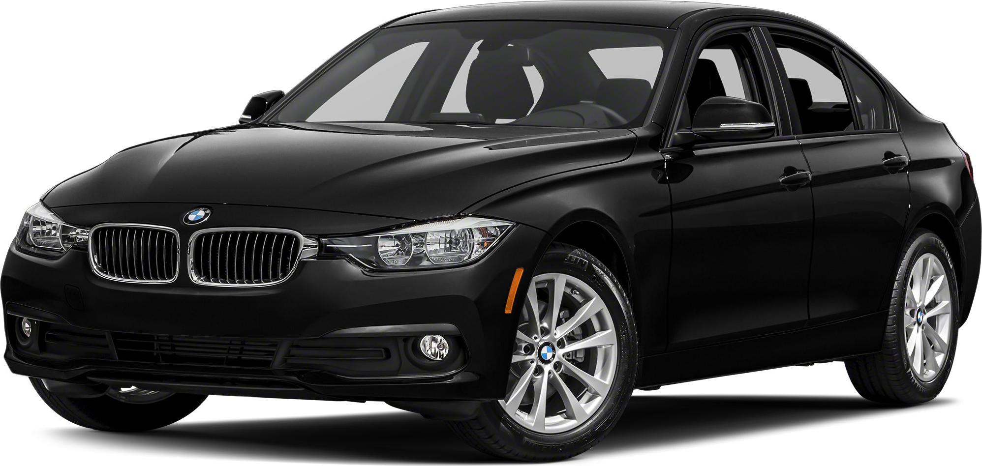 Front side view of black sedan with signature grille and headlights