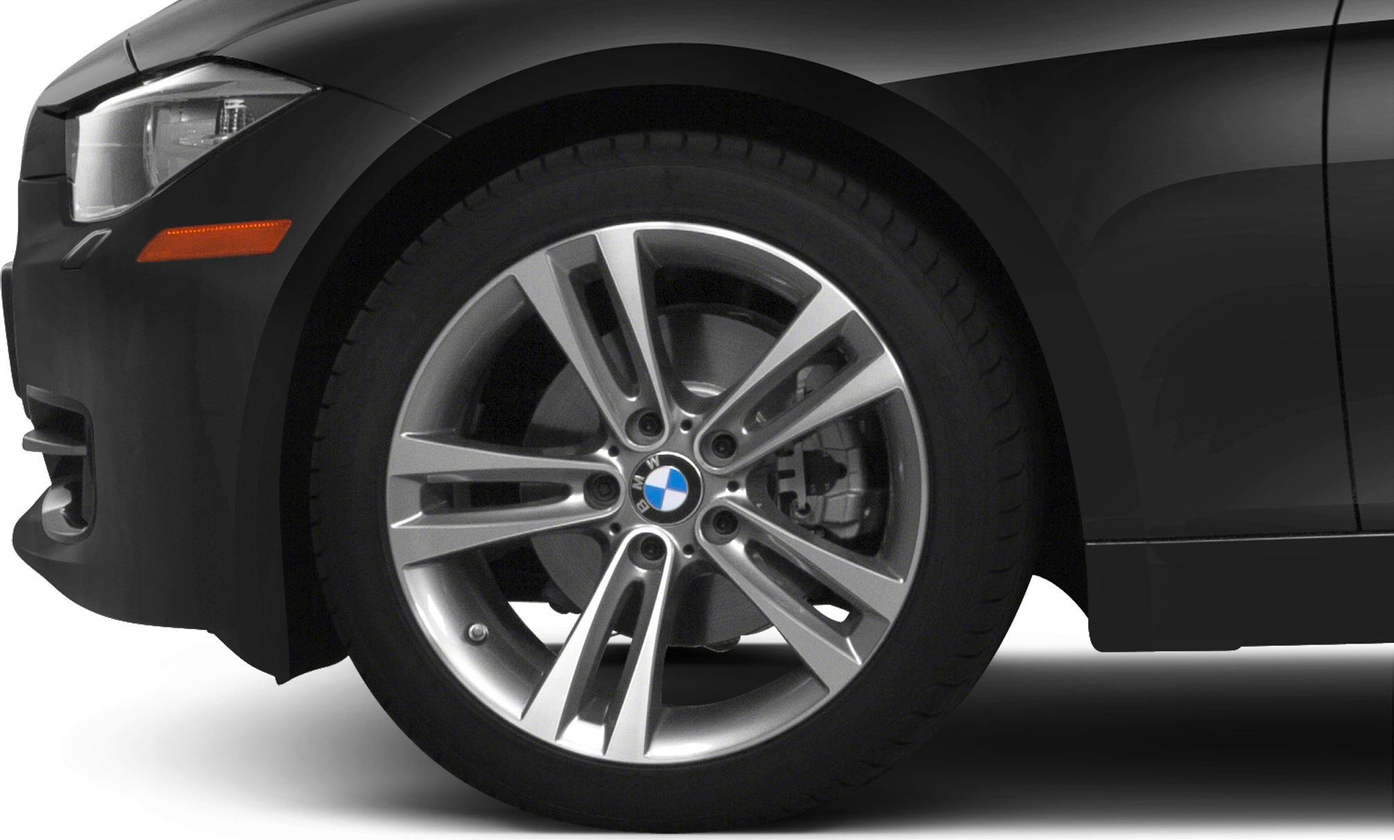 Close-up of alloy wheel and front headlight details