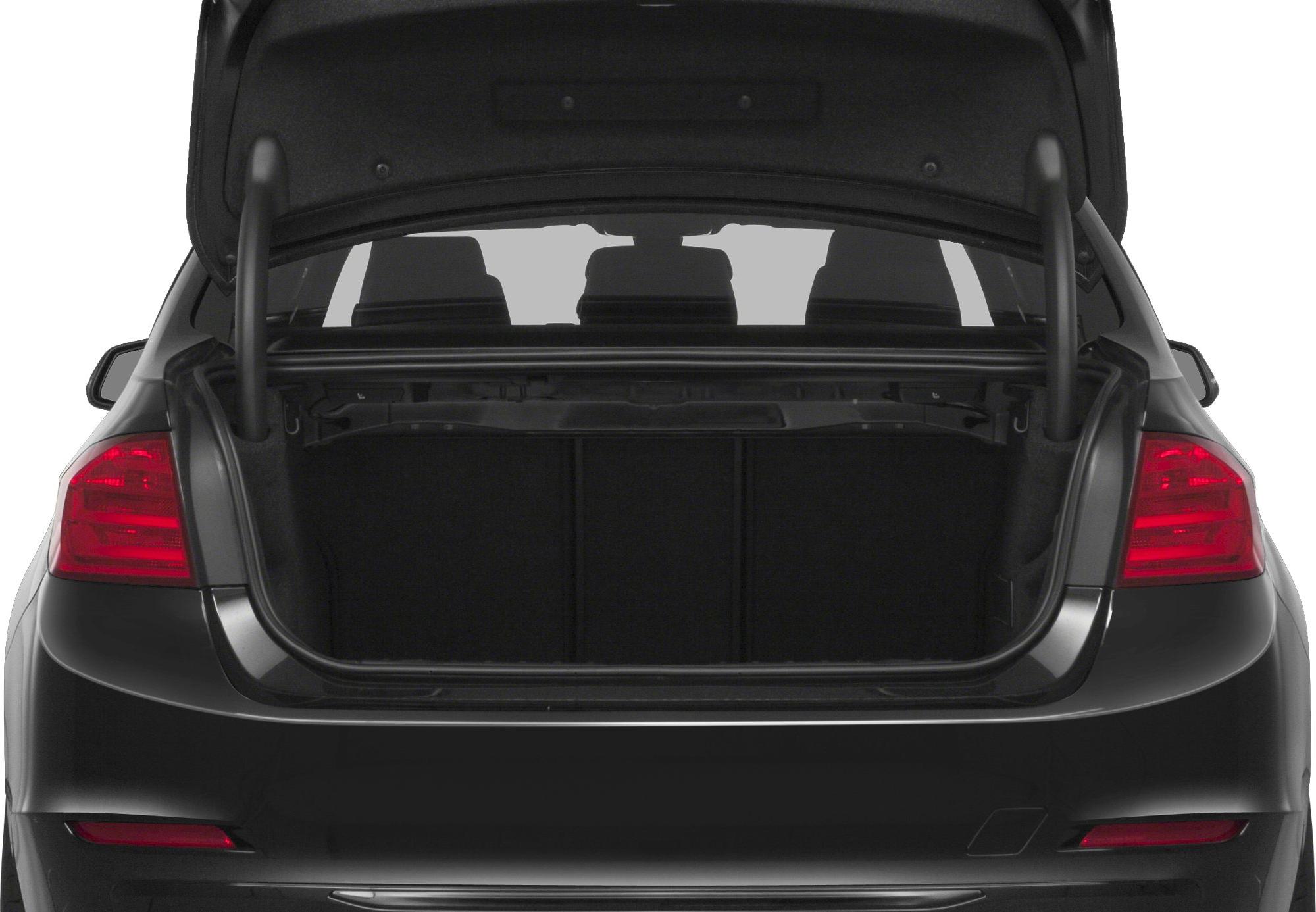 Open trunk and rear tail lights of a sedan