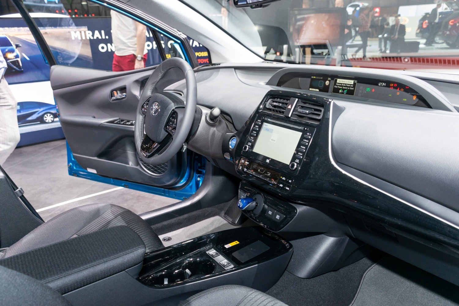 Modern car interior with digital dashboard and ergonomic steering wheel