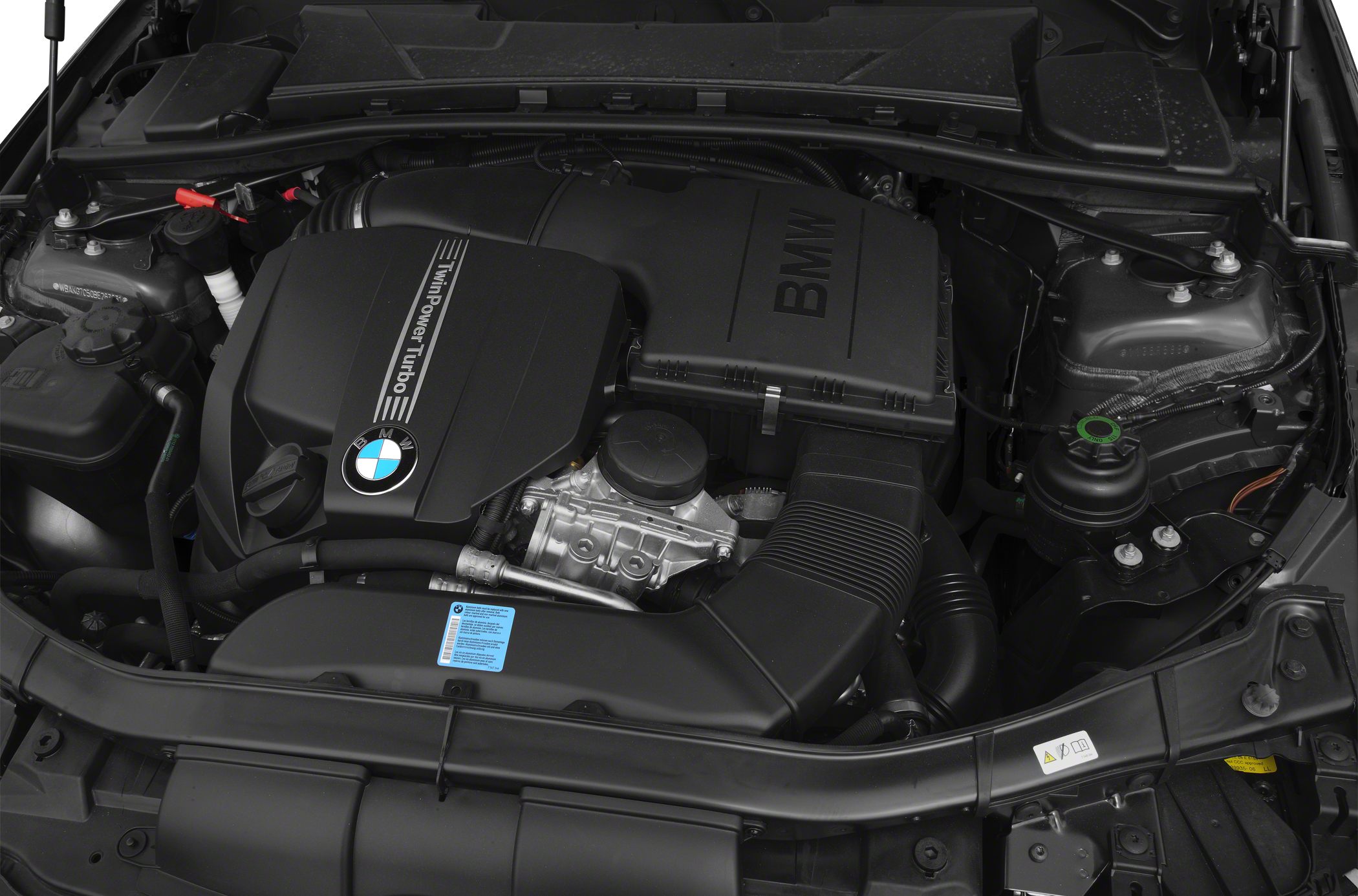 TwinPower Turbo engine bay with detailed components and BMW branding