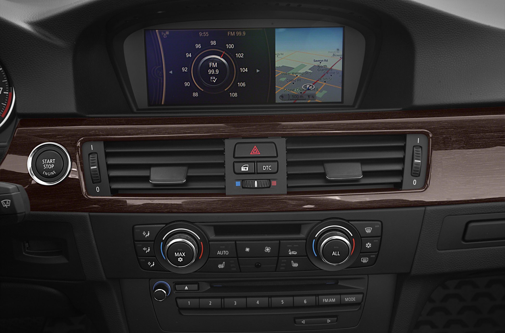 Car dashboard with navigation screen and dual-zone climate control
