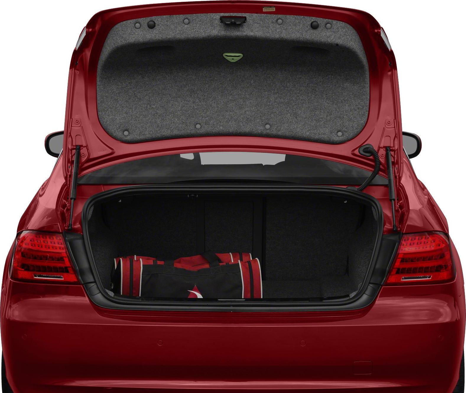 Open rear trunk with a red and black bag inside