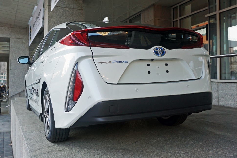Rear view with distinctive taillights and hatchback design