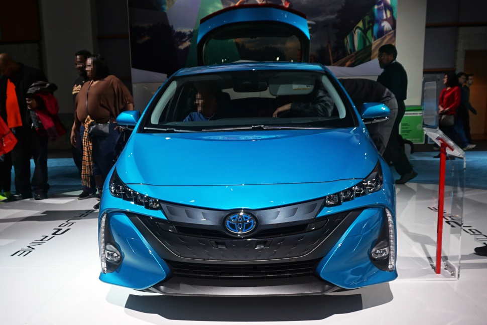 Blue car with modern grille and sleek headlights front view