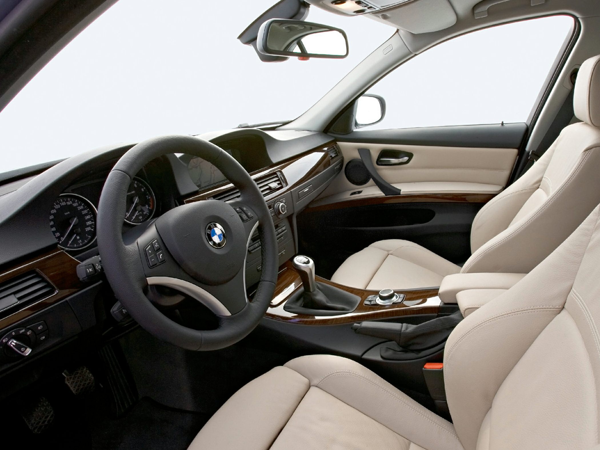 Beige leather interior, wood trim, manual transmission