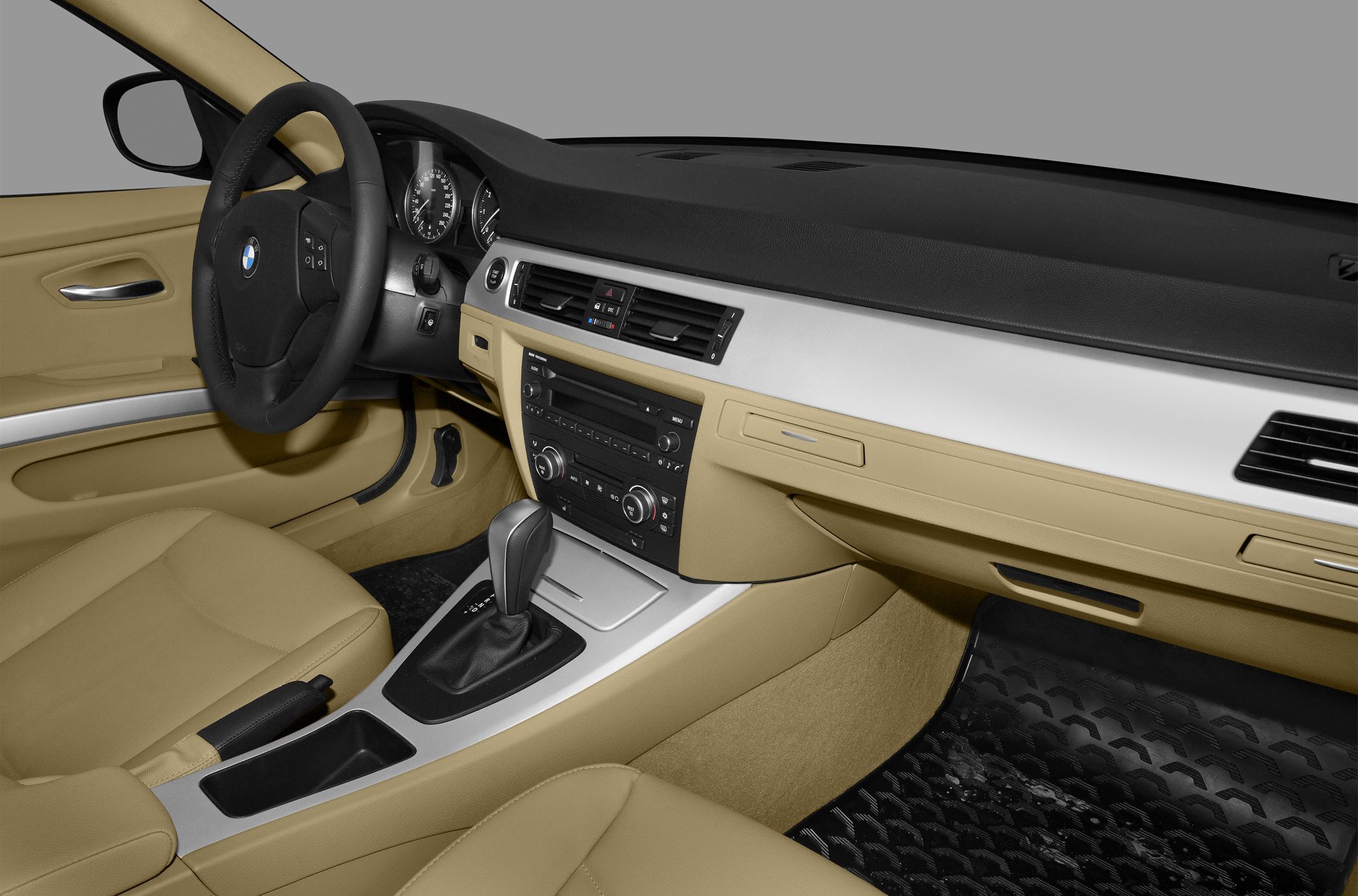 Dashboard, steering wheel, center console in beige car interior