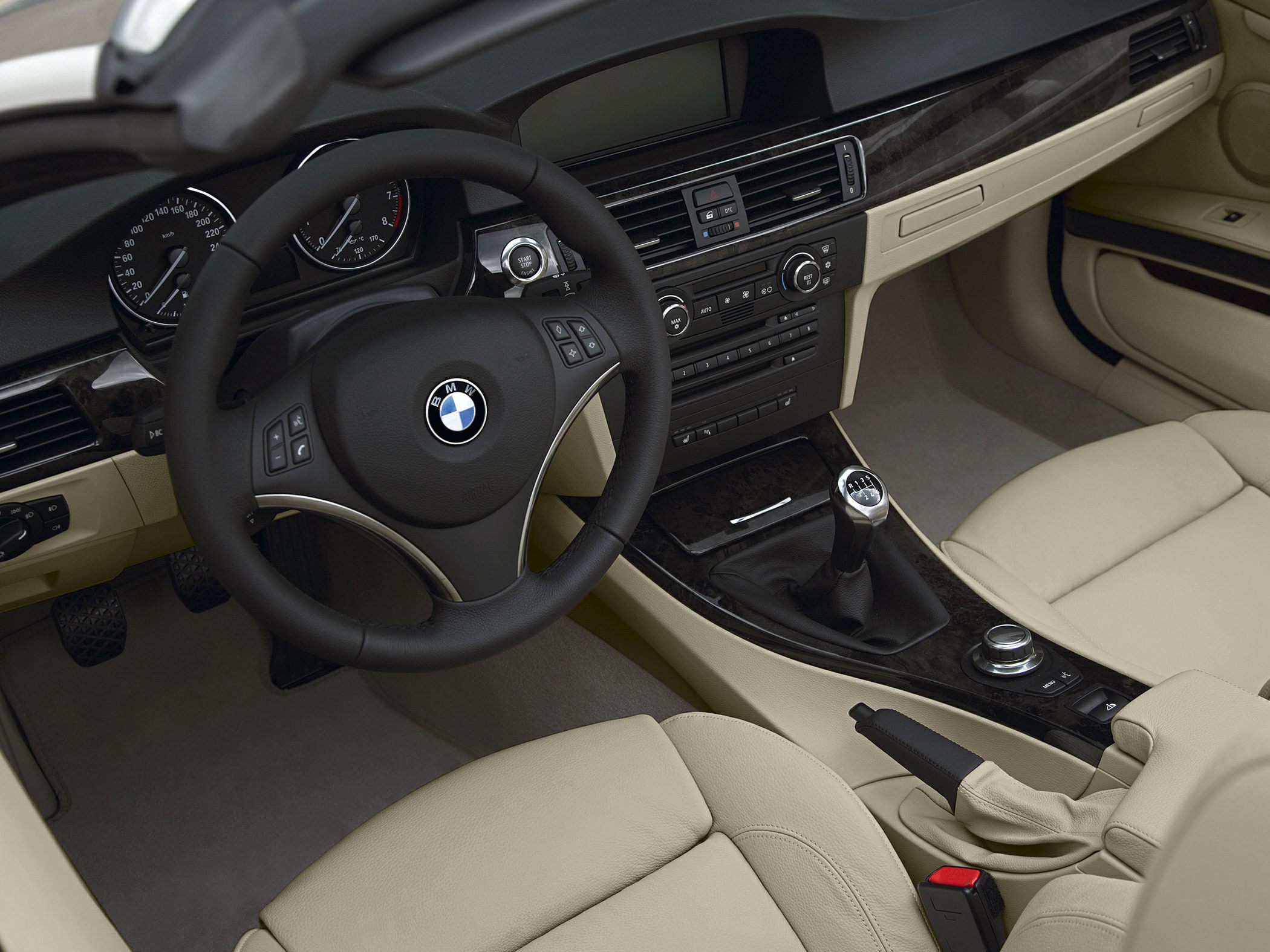 Beige leather interior and manual transmission gear shift