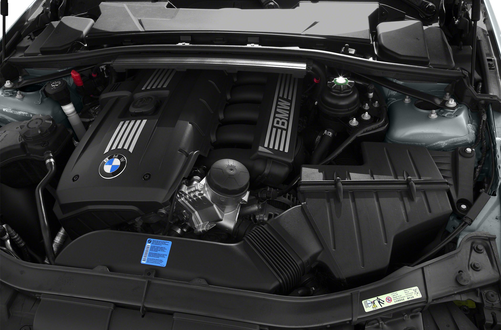 BMW E92 engine bay with detailed engine cover and components
